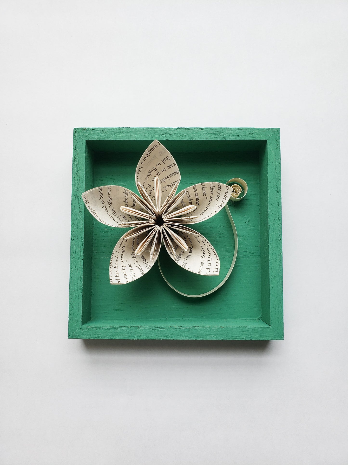 A star shaped book page paper flower in a square frame - Novel Blossoms Co