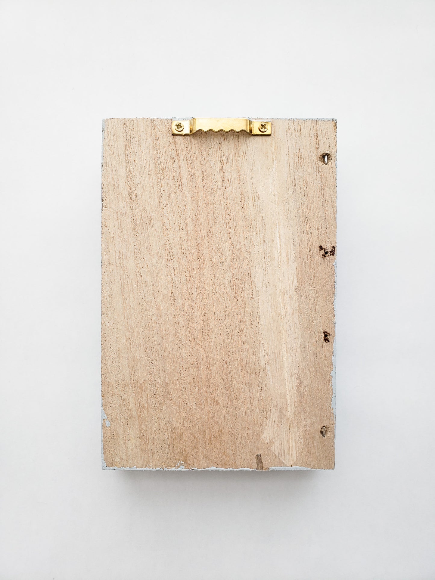 the picture hanger on the back of a portrait shaped frame - Novel Blossoms Co
