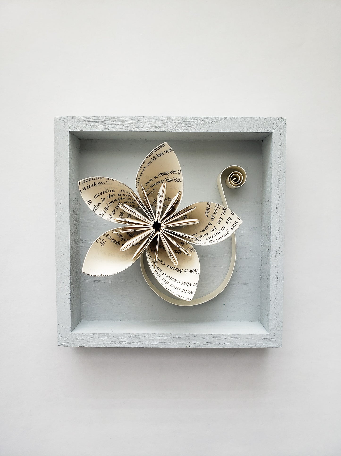A star shaped book page paper flower in a square frame - Novel Blossoms Co