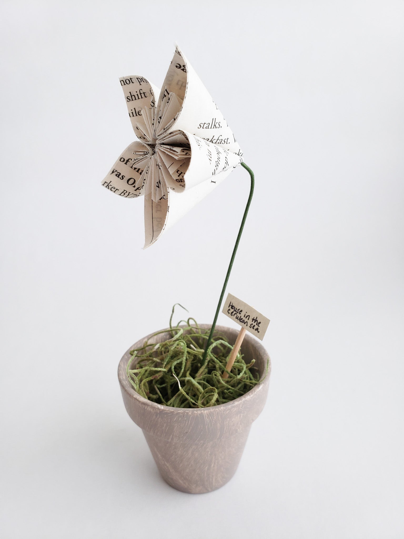 a potted star-shaped book page paper flower - Novel Blossoms Co