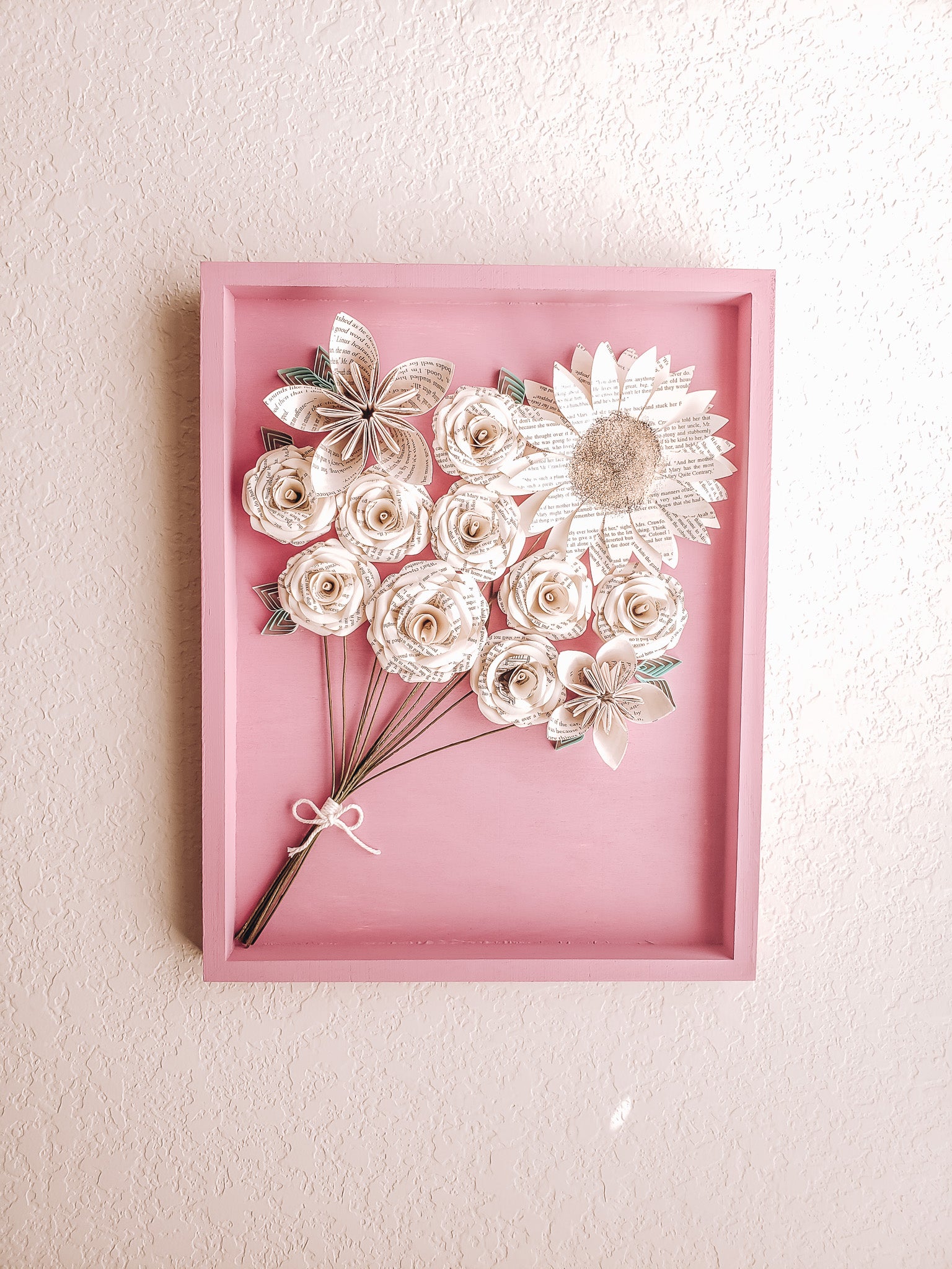 Framed art piece of book page paper flowers in the shape of a bouquet - Novel Blossoms Co