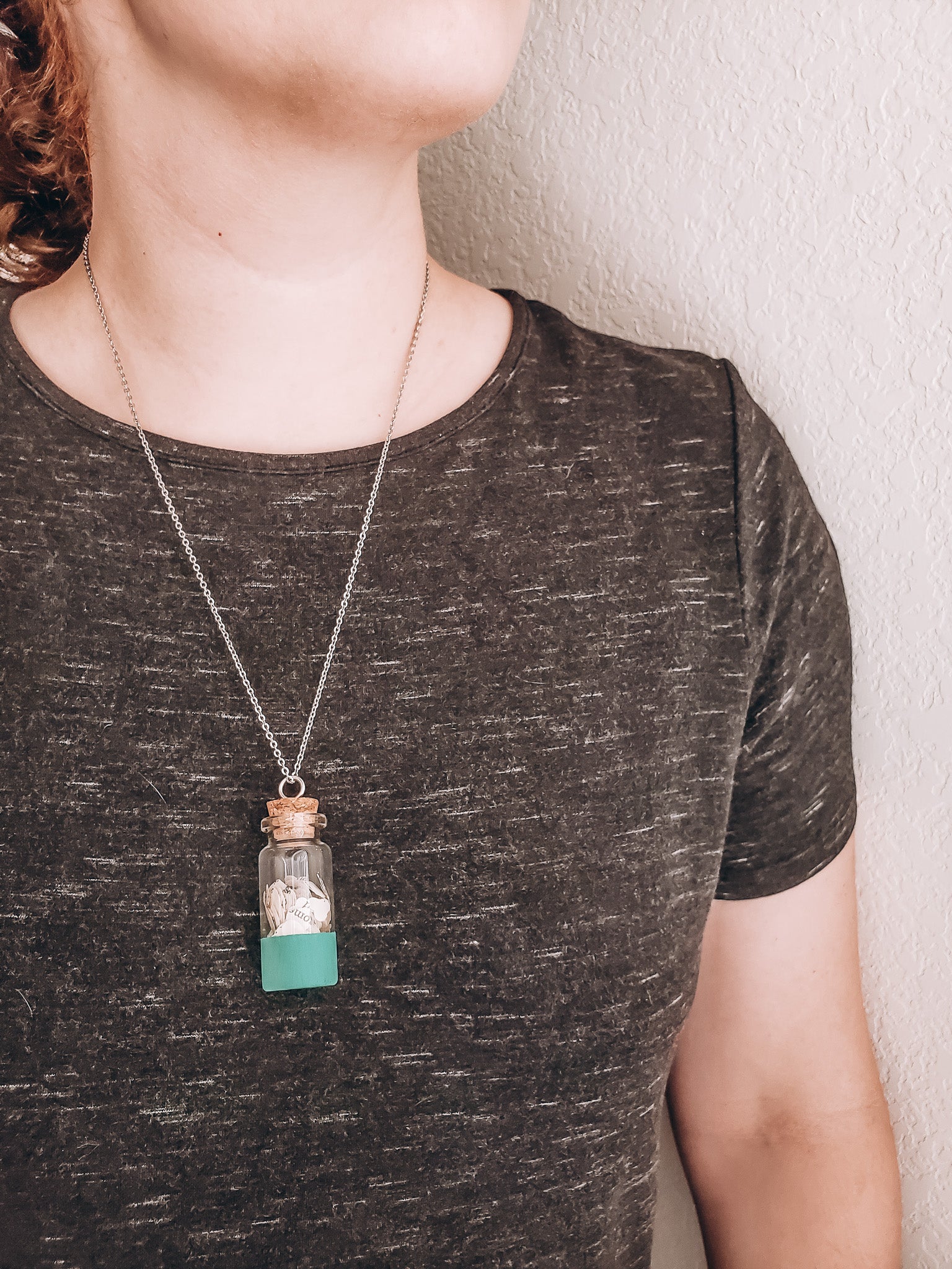 A person wearing the wish jar bookish necklace - Novel Blossoms Co